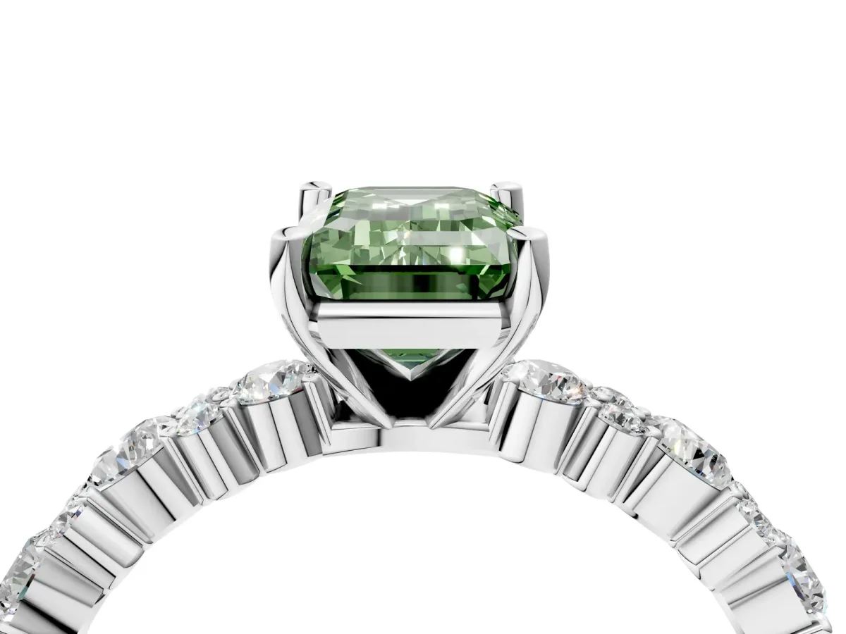 Fancy Green Emerald Cut Diamond Side Stone Solitaire Ring with Round and Four-Prong Setting Platinum