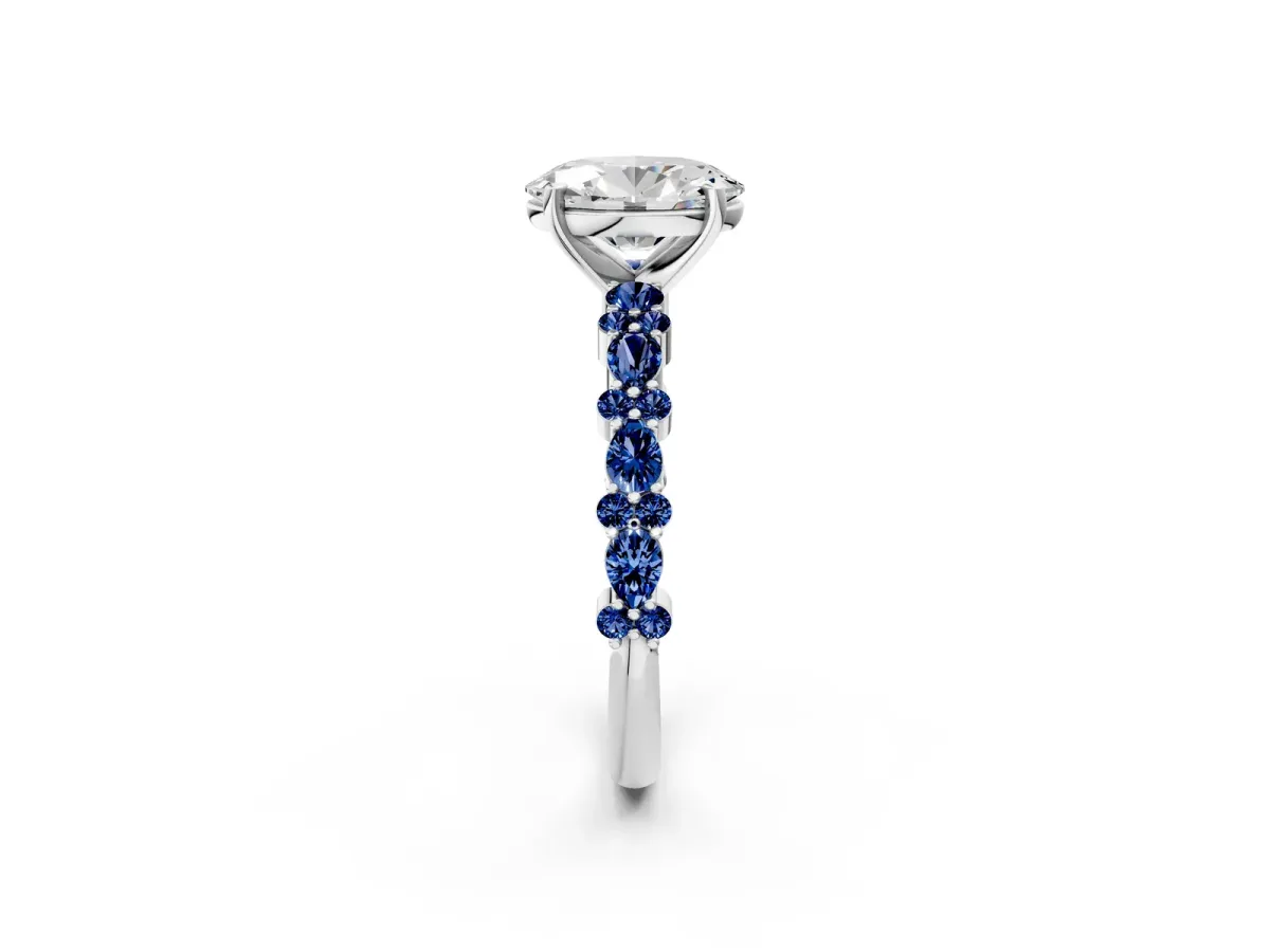 Oval Cut Diamond Side Stone Solitaire Ring with Round Blue Sapphire and Four-Prong Setting Platinum