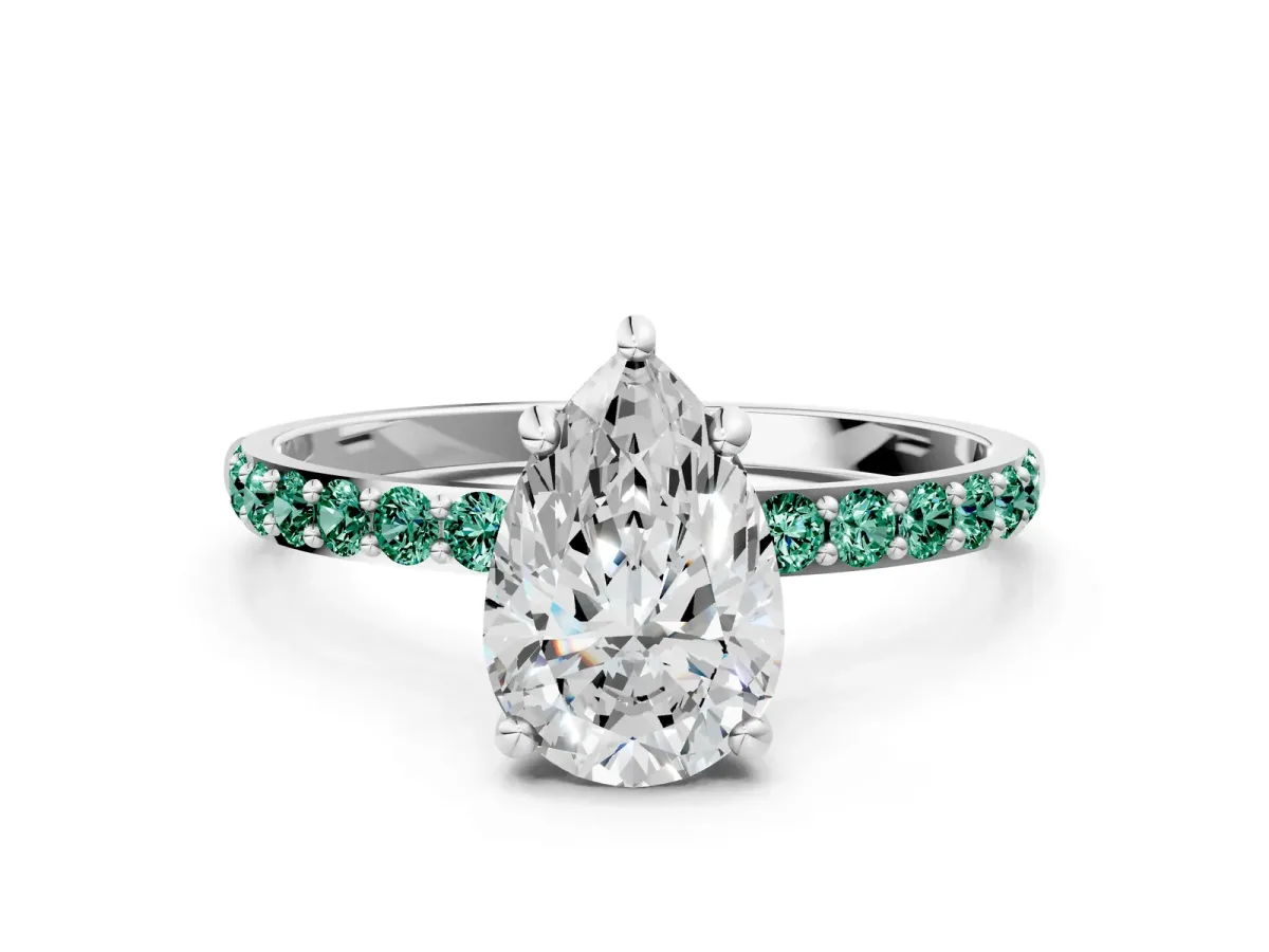 Pear Cut Diamond Solitaire Ring with Round Green Sapphire Pavé Band and Prong Setting Platinum