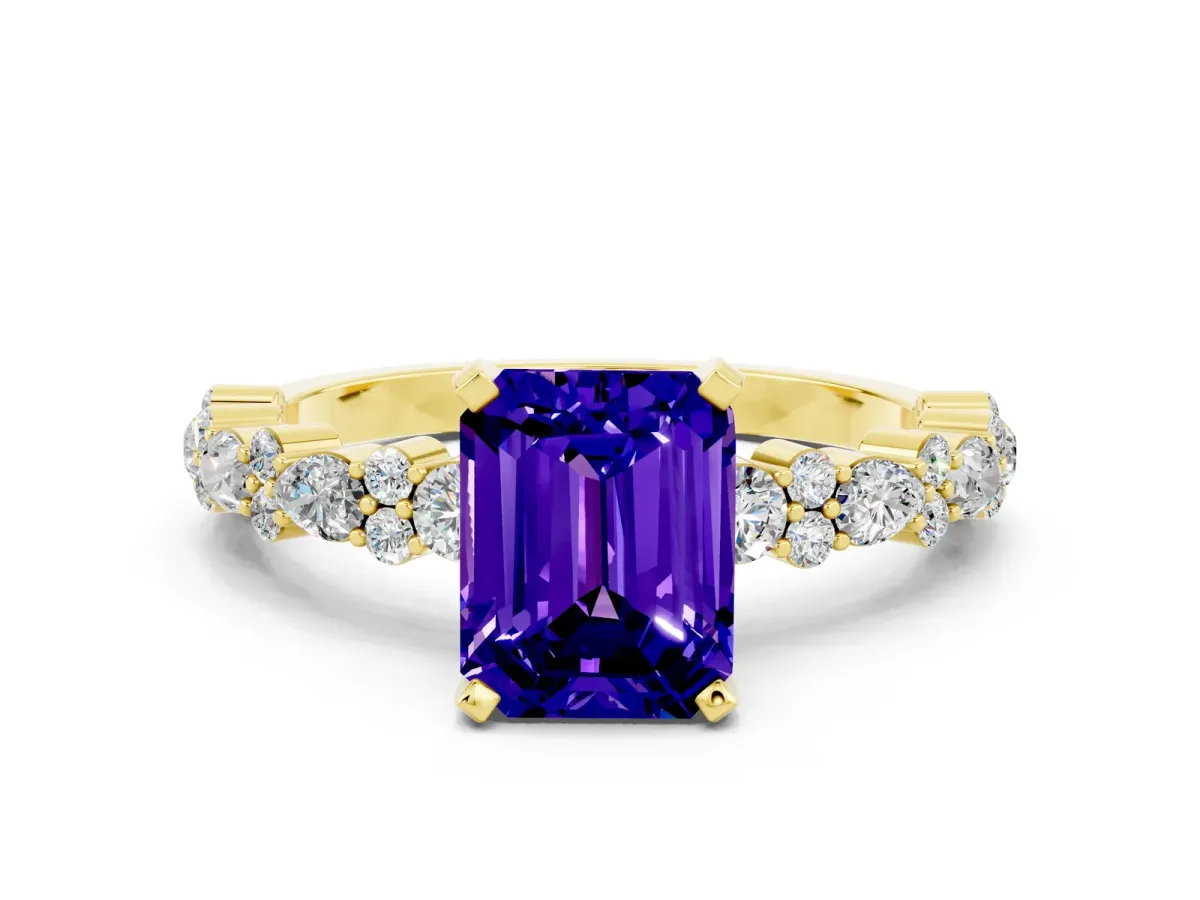 Emerald Cut Tanzanite Side Stone Solitaire Ring with Round and Four-Prong Setting Yellow gold