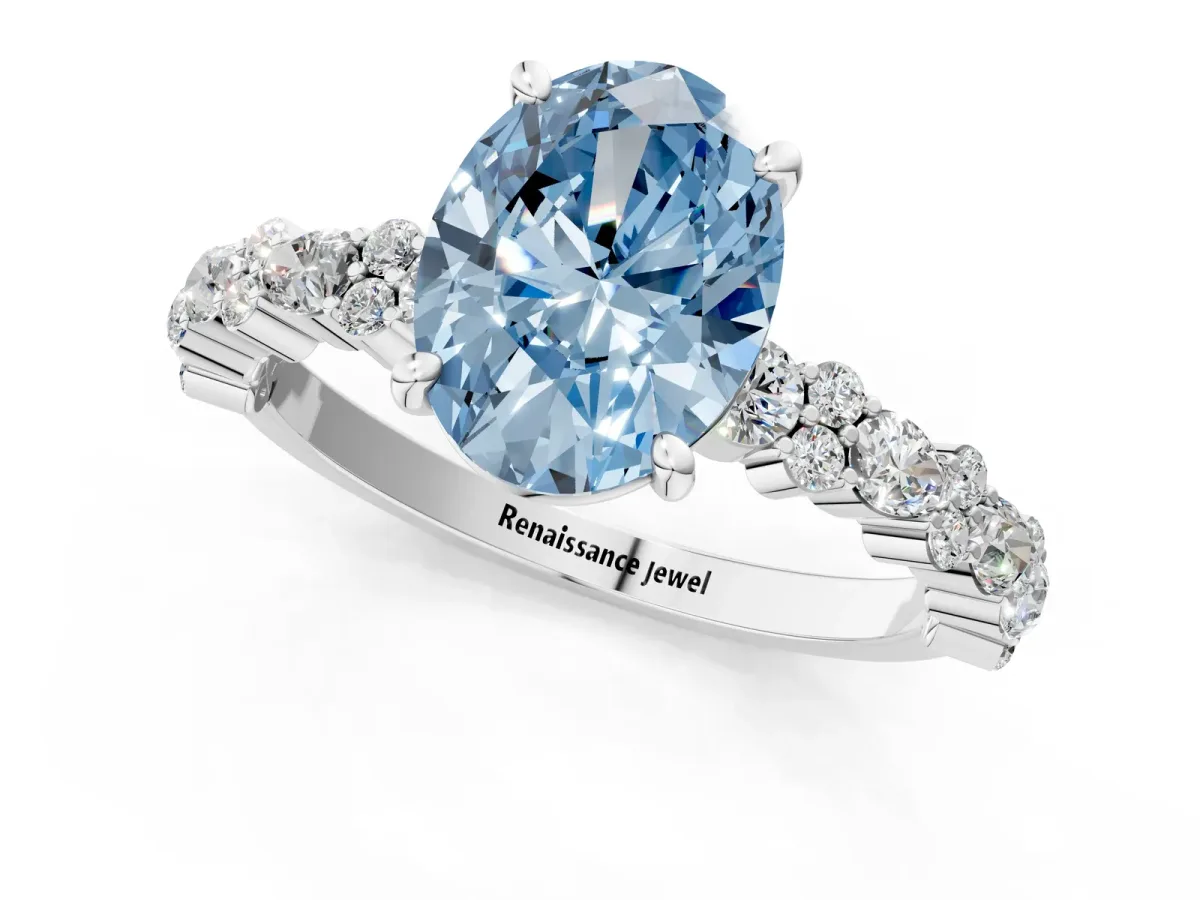 Fancy Blue Oval Cut Diamond Side Stone Solitaire Ring with Round and Four-Prong Setting Platinum