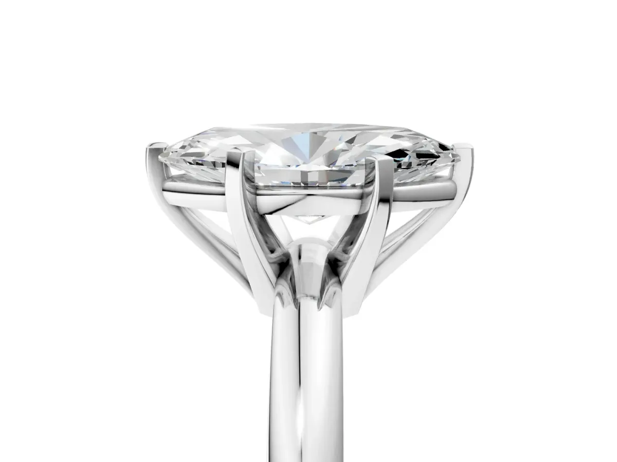 Marquise Cut Diamond Solitaire Engagement Ring with Round Band and Four-Prong Setting Platinum