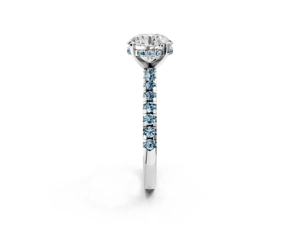Round Cut Diamond Solitaire Ring with Round Aquamarine Pavé Band and Four-Prong Setting Silver