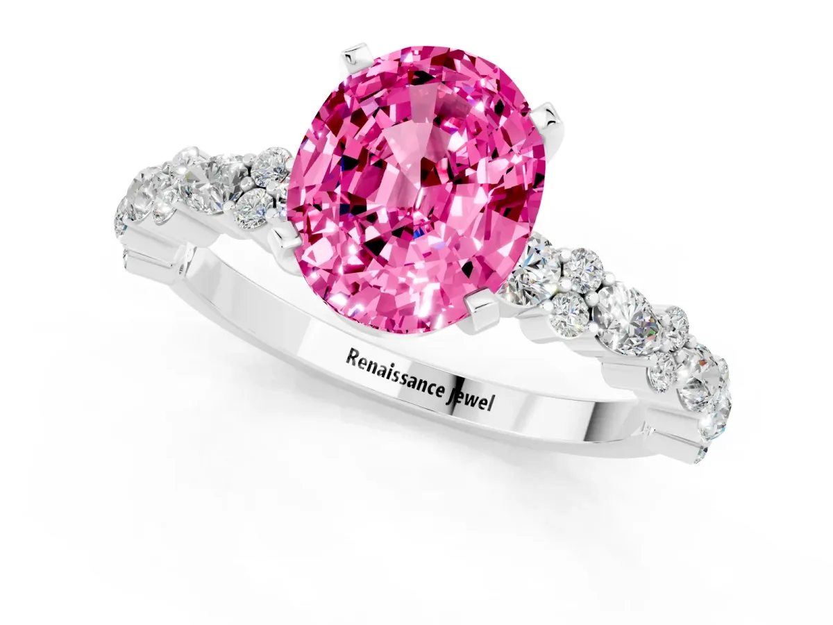 Oval Cut Pink Sapphire Side Stone Solitaire Ring with Round and Four-Prong Setting White gold