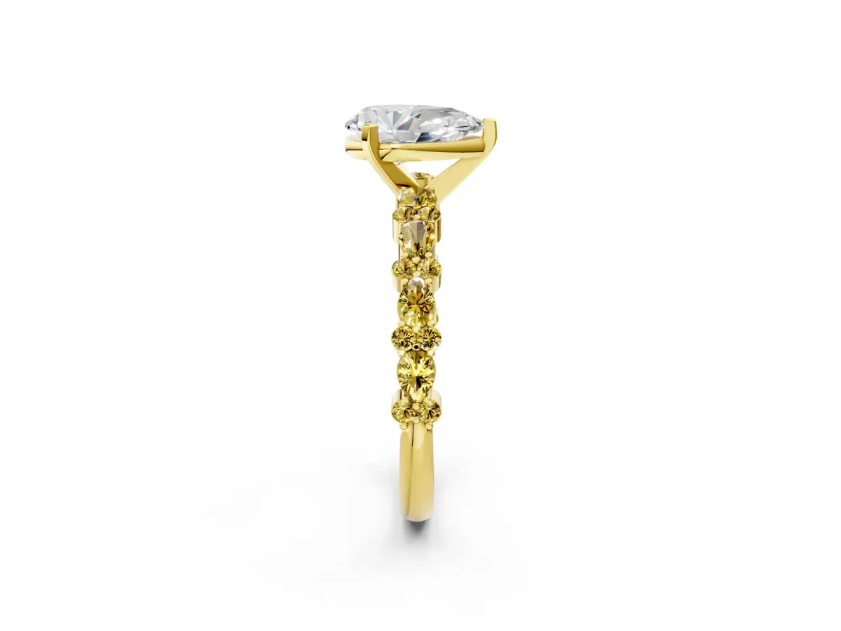 Pear Cut Diamond Side Stone Solitaire Ring with Round Yellow Sapphire and Four-Prong Setting Yellow gold