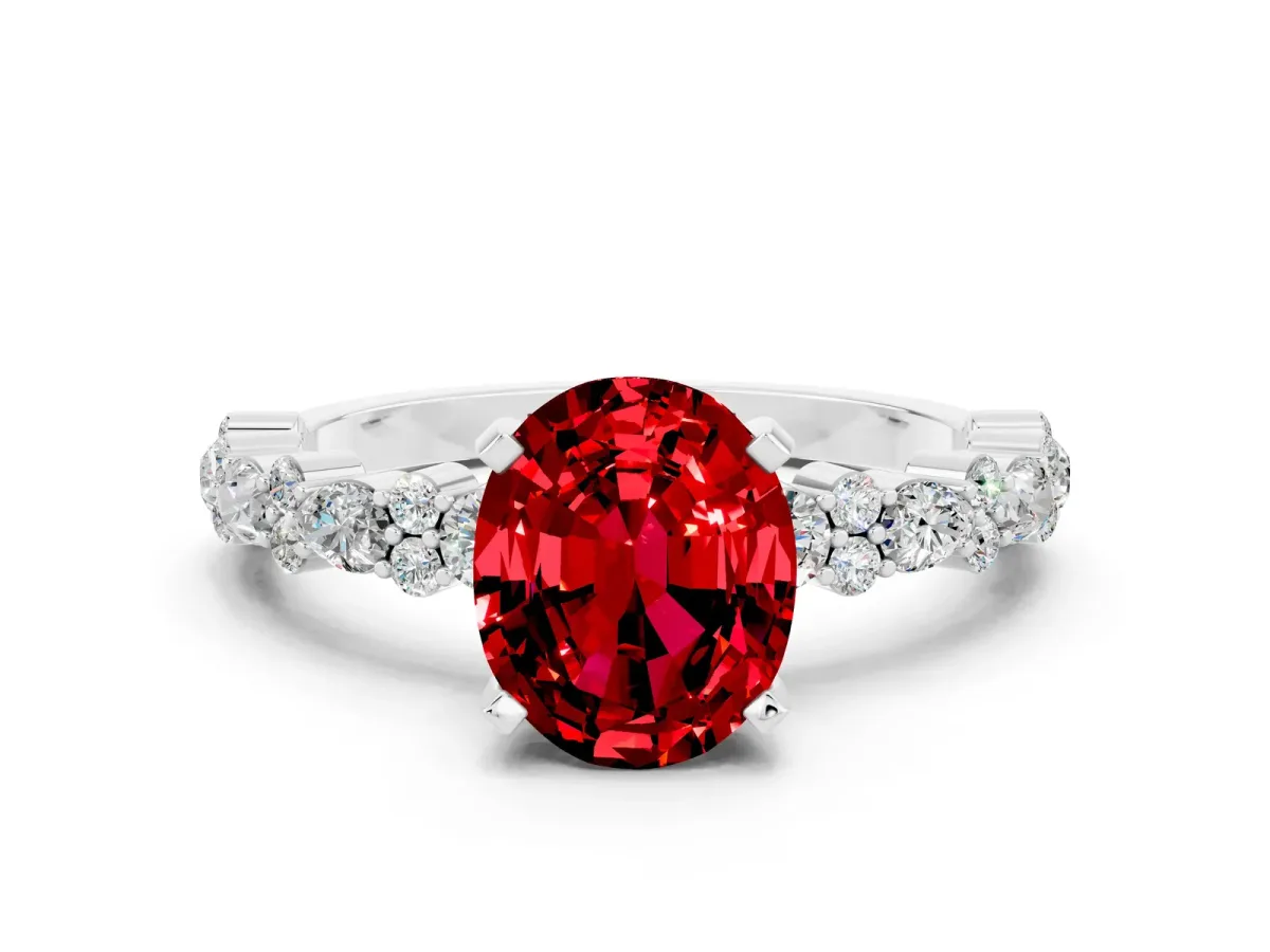 Oval Cut Ruby Side Stone Solitaire Ring with Round and Four-Prong Setting White gold