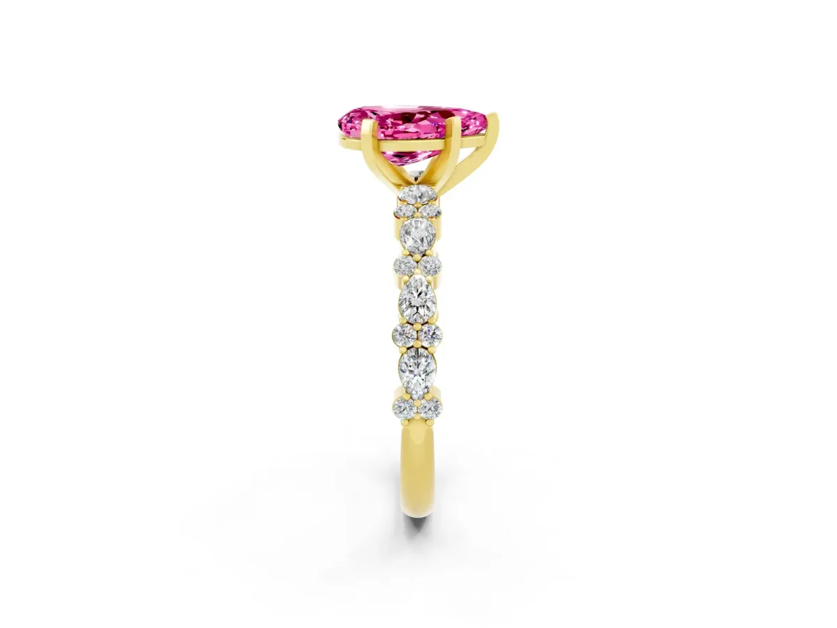 Pear Cut Pink Sapphire Side Stone Solitaire Ring with Round and Four-Prong Setting Yellow gold