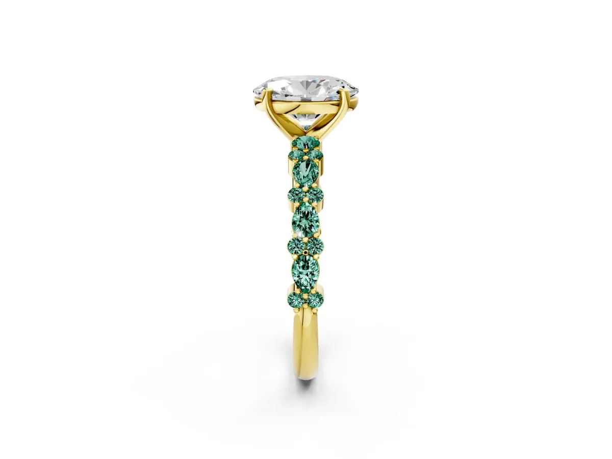 Oval Cut Diamond Side Stone Solitaire Ring with Round Green Sapphire and Four-Prong Setting Yellow gold