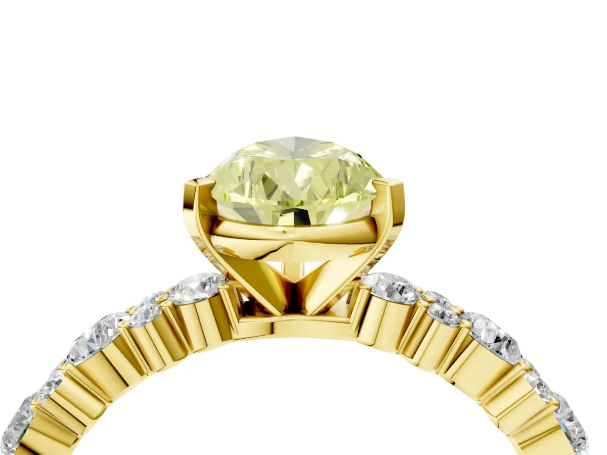 Fancy Yellow Pear Cut Diamond Side Stone Solitaire Ring with Round and Four-Prong Setting Yellow gold