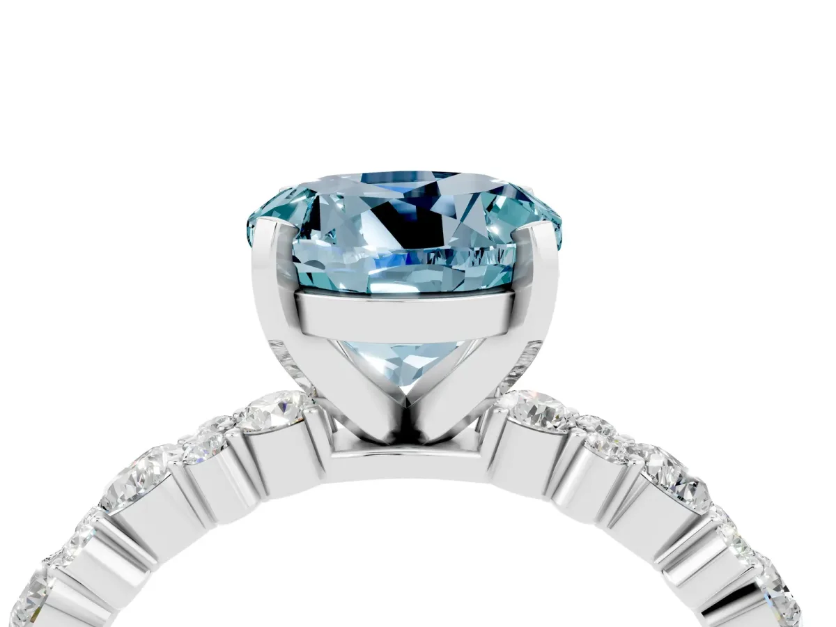 Round Cut Aquamarine Side Stone Solitaire Ring with Round and Four-Prong Setting White gold