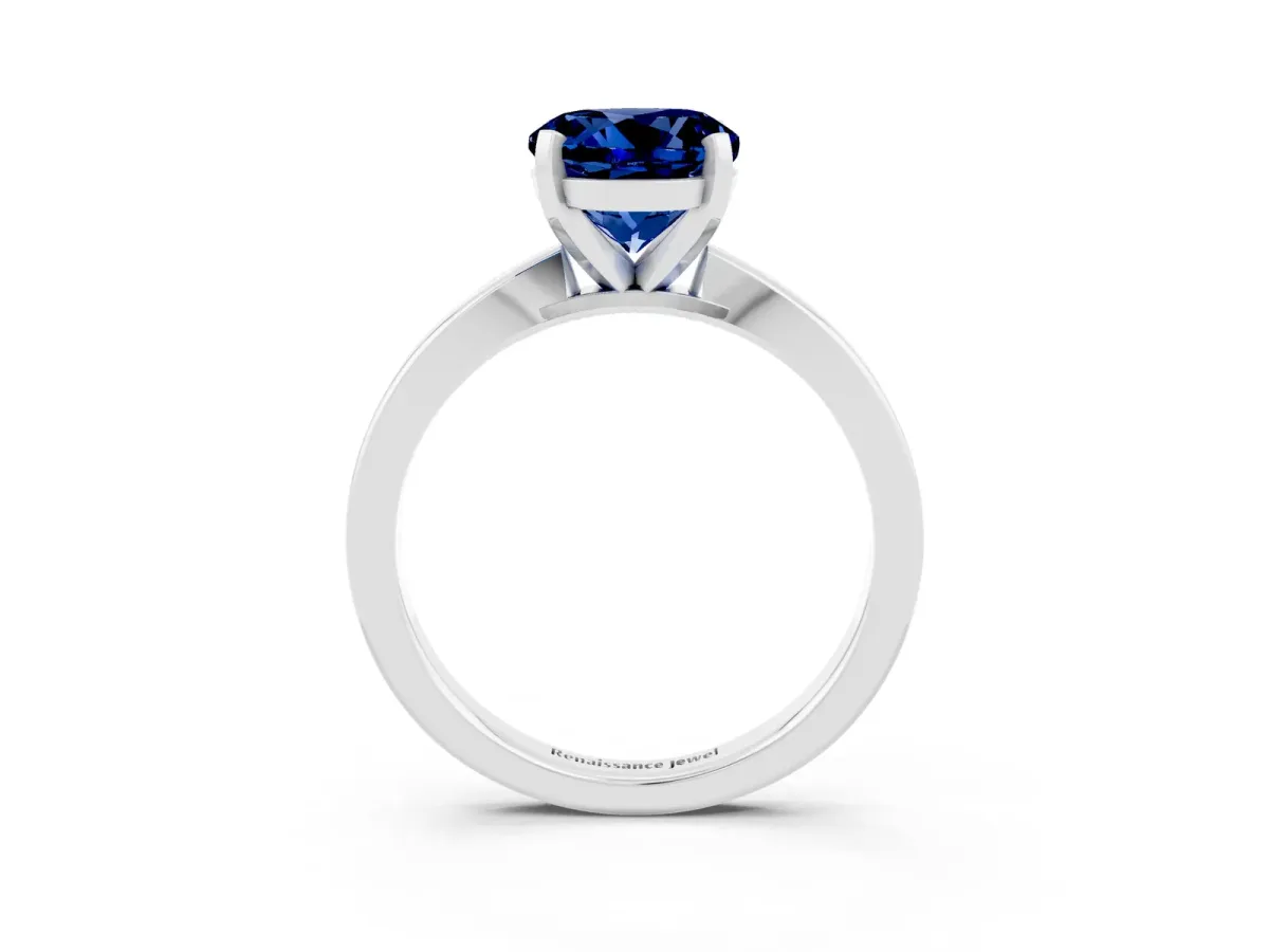 Round Cut Blue Sapphire Solitaire Engagement Ring with Classic Band and Four-Prong Setting Silver