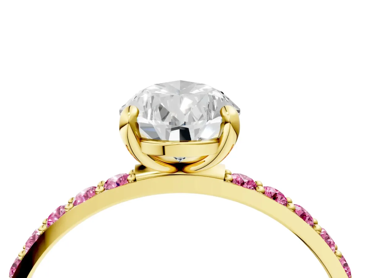 Pear Cut Diamond Solitaire Ring with Round Pink Sapphire Pavé Band and Prong Setting Yellow gold