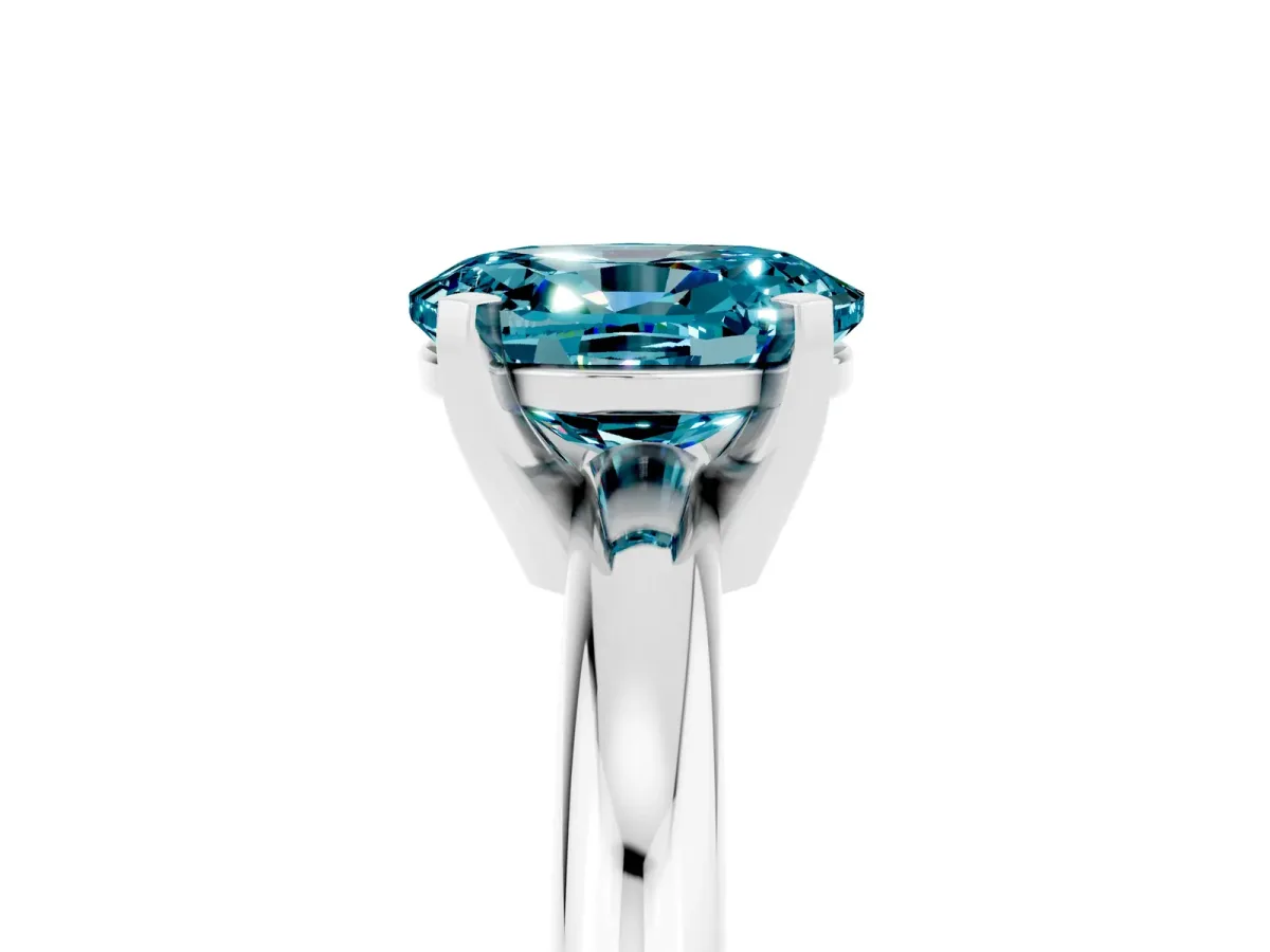 Oval Cut Blue Topaz Solitaire Engagement Ring with Round Band and Four-Prong Setting Platinum