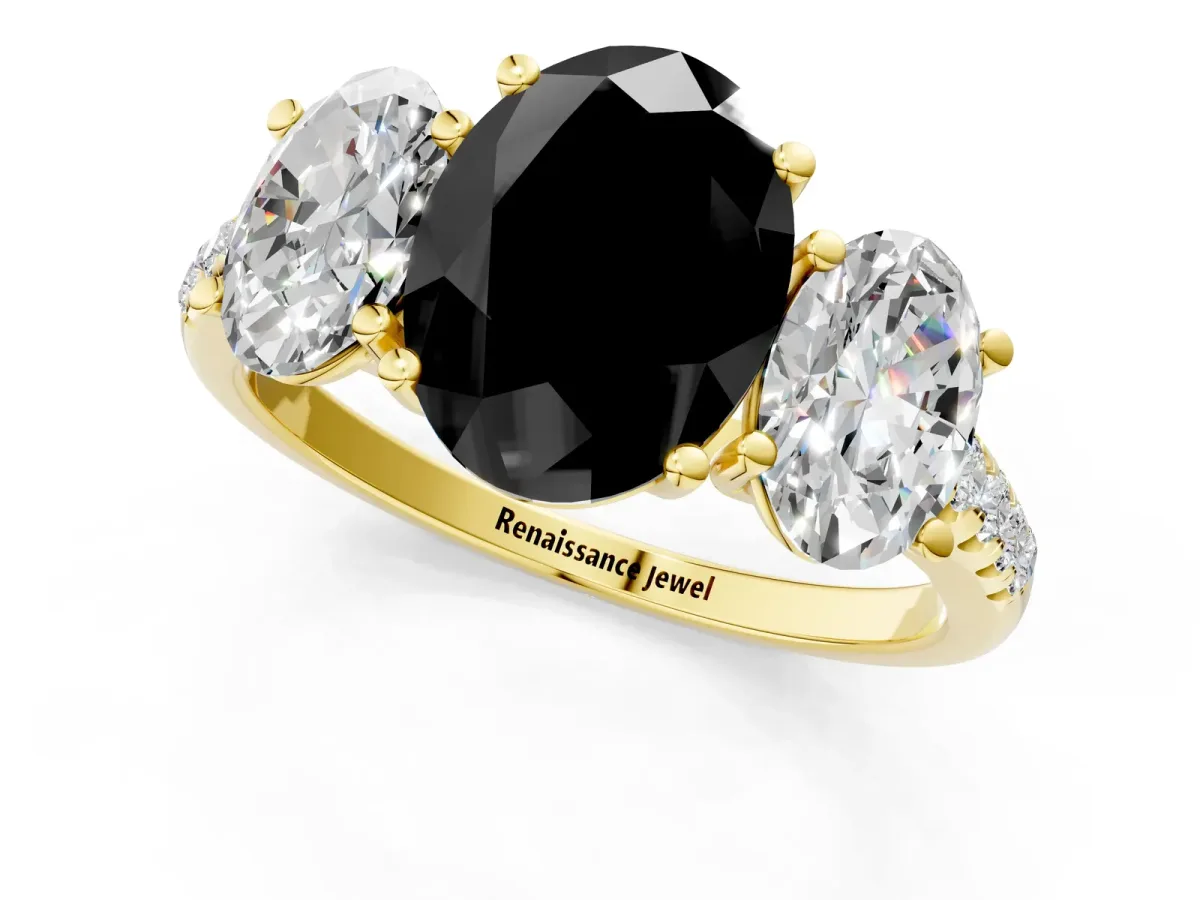 Fancy Black Three-Stone Oval Cut Diamond Ring with Round Pavé Band and Prong Setting Yellow gold