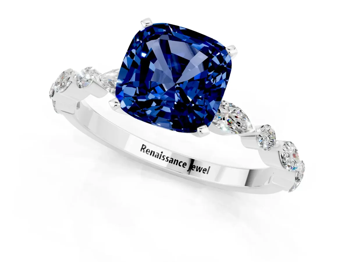 Cushion Cut Blue Sapphire Ring with Marquise and Round Side Stones and Four-Prong Setting Silver