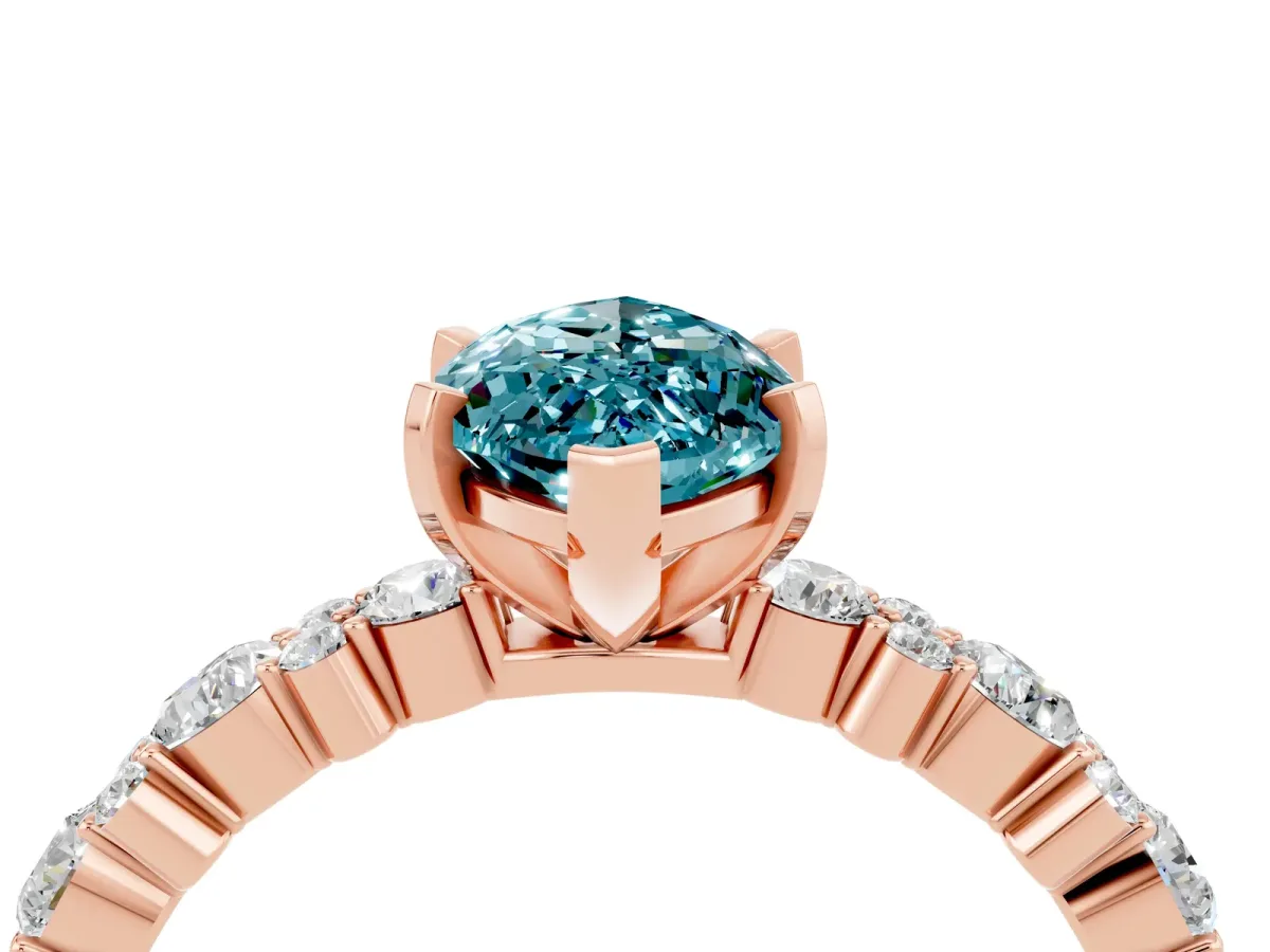 Marquise Cut Blue Topaz Side Stone Solitaire Ring with Round and Four-Prong Setting Rose gold