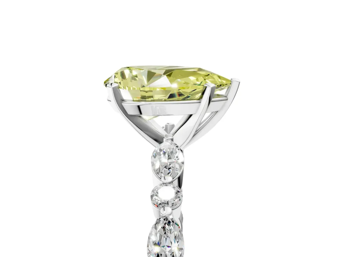 Fancy Yellow Pear Cut Diamond Ring with Marquise and Round Side Stones and Four-Prong Setting Platinum