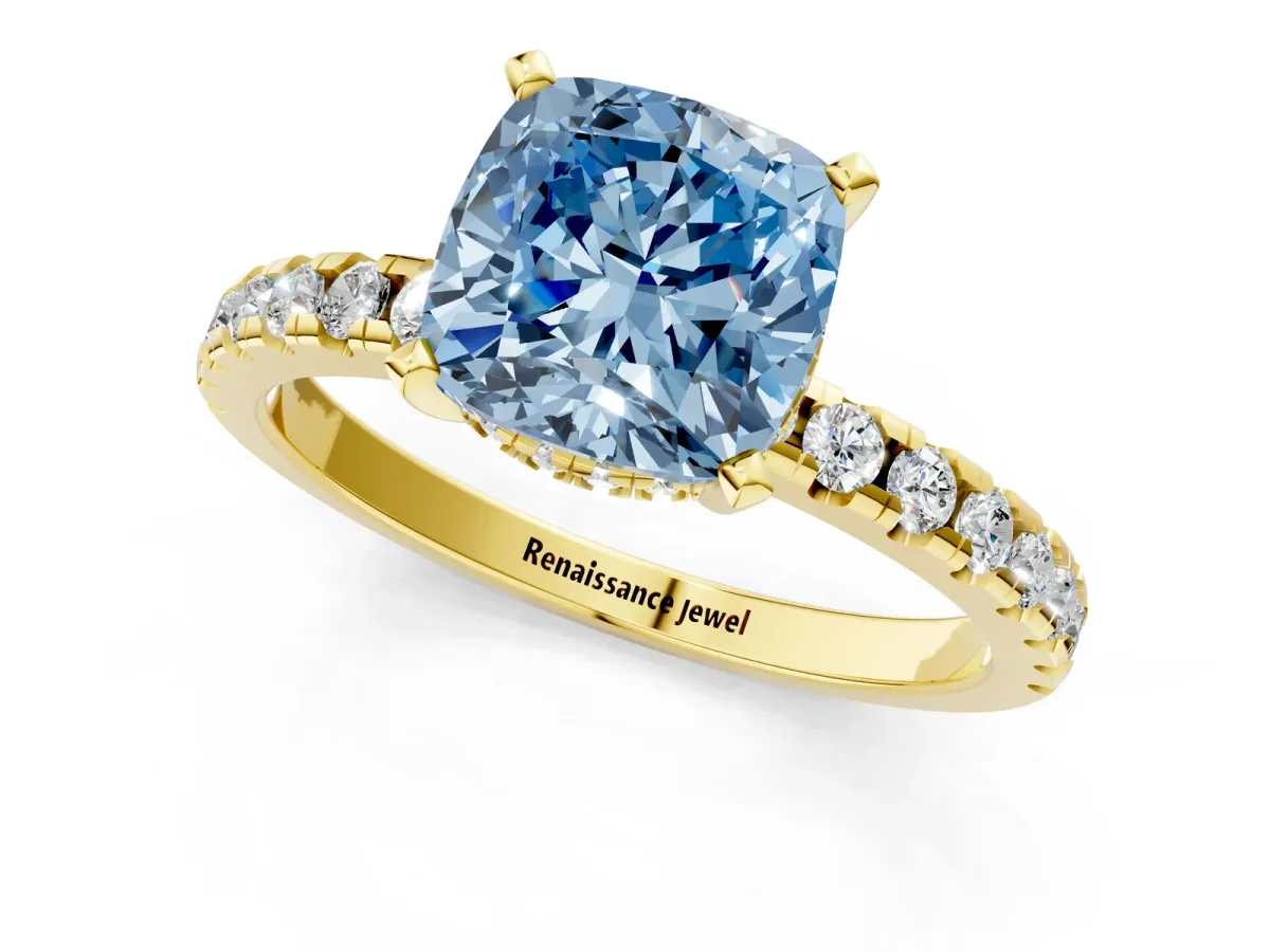 Fancy Blue Cushion Cut Diamond Solitaire Ring with Round Pavé Band and Four-Prong Setting Yellow gold