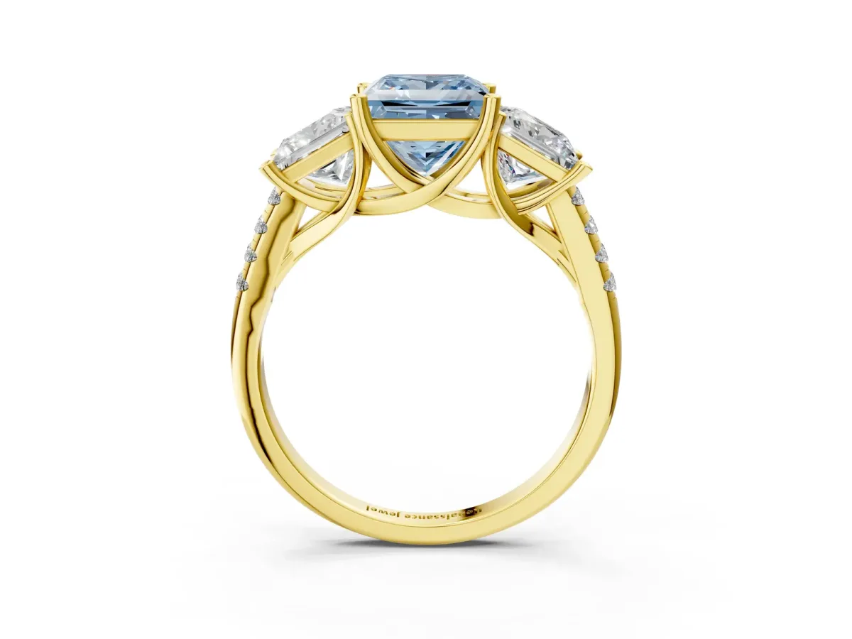 Fancy Blue Three-Stone Princess Cut Diamond Ring with Round Pavé Band and Prong Setting Yellow gold