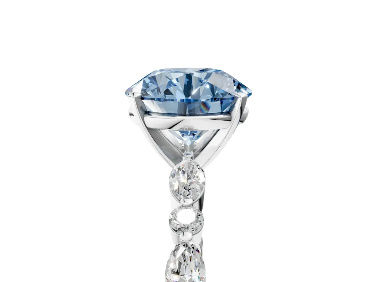 Fancy Blue Round Cut Diamond Ring with Marquise and Round Side Stones and Four-Prong Setting White gold