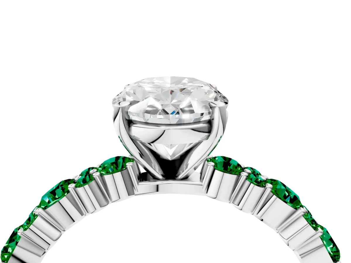 Oval Cut Diamond Side Stone Solitaire Ring with Round Emerald and Four-Prong Setting White gold