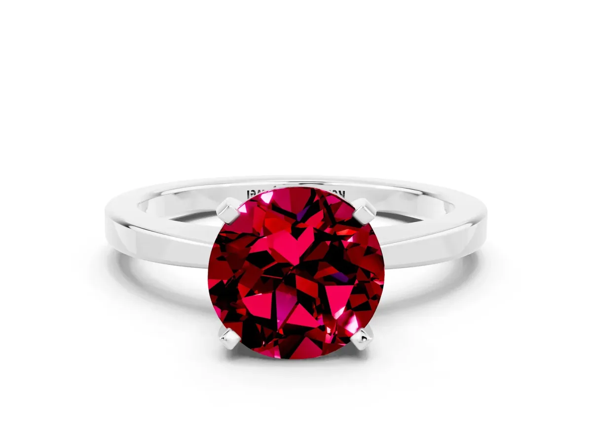 Round Cut Garnet Solitaire Engagement Ring with Classic Band and Four-Prong Setting Silver