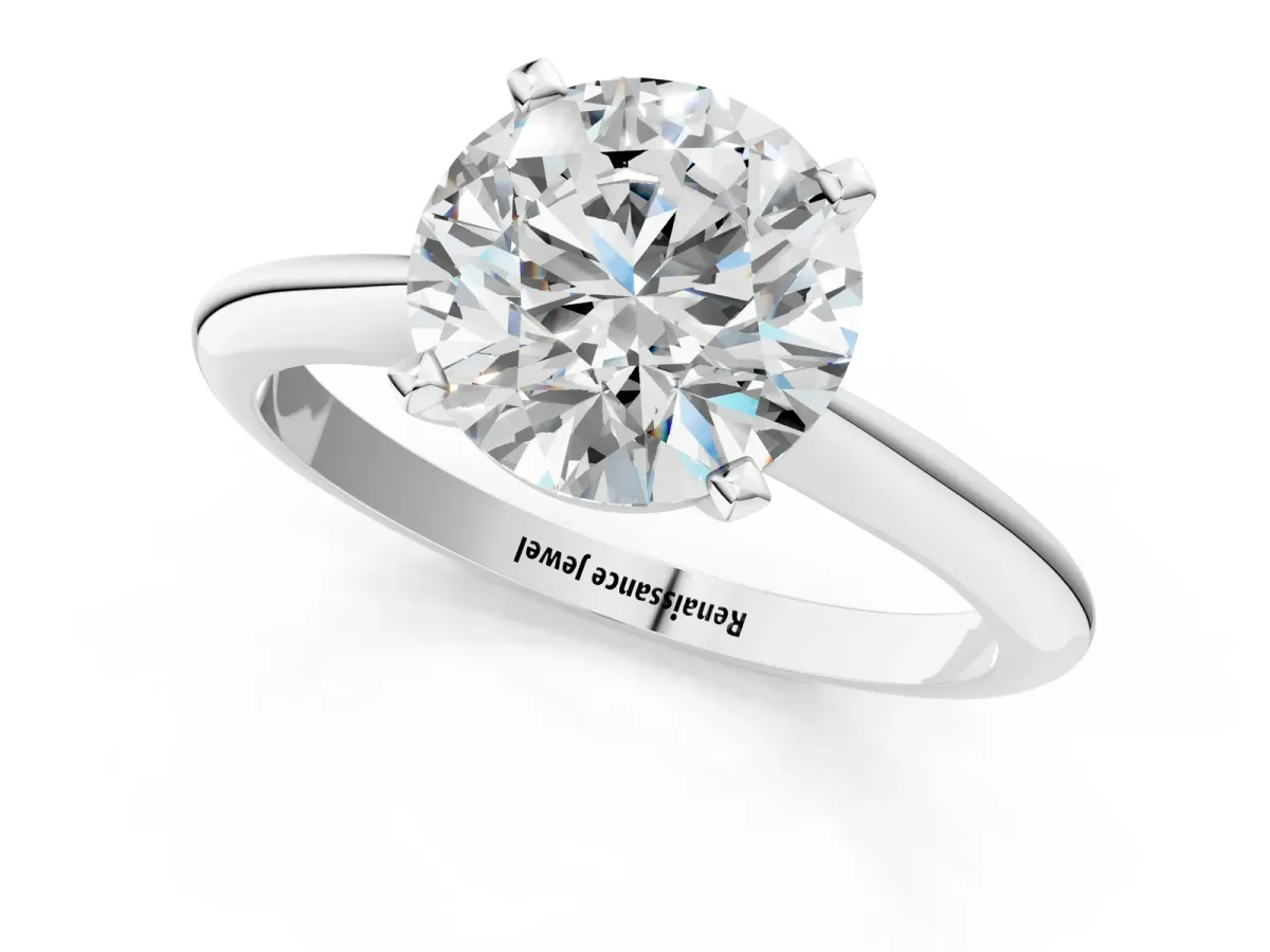 Round Cut Diamond Solitaire Engagement Ring with Classic Band and Four-Prong Setting White gold