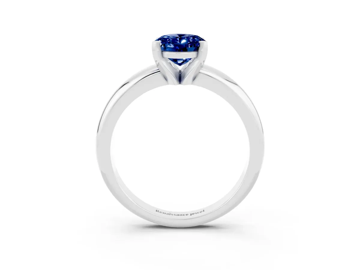 Oval Cut Blue Sapphire Solitaire Engagement Ring with Round Band and Four-Prong Setting Silver
