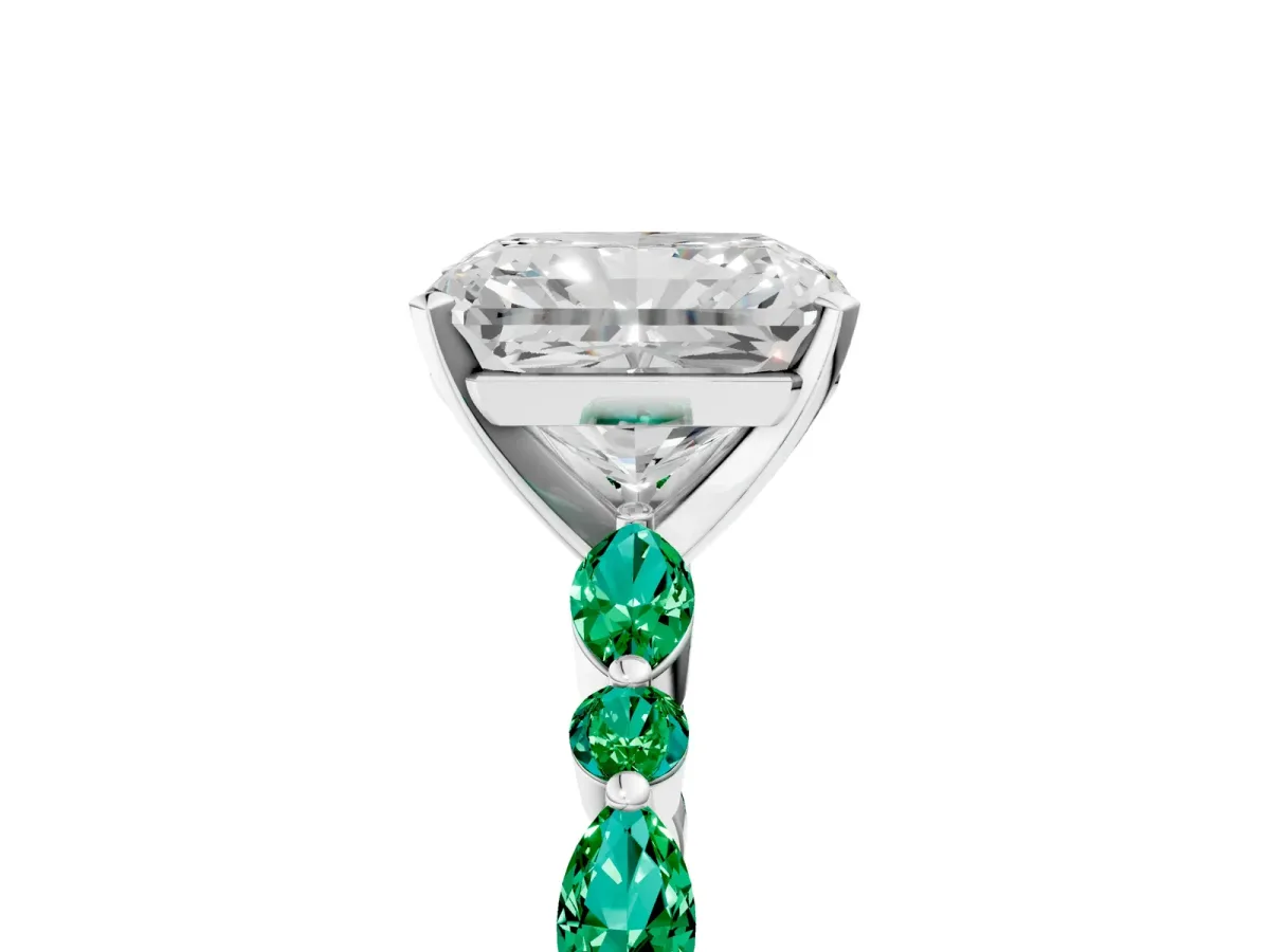 Radiant Cut Diamond Ring with Marquise and Round Emerald Side Stones and Four-Prong Setting Platinum