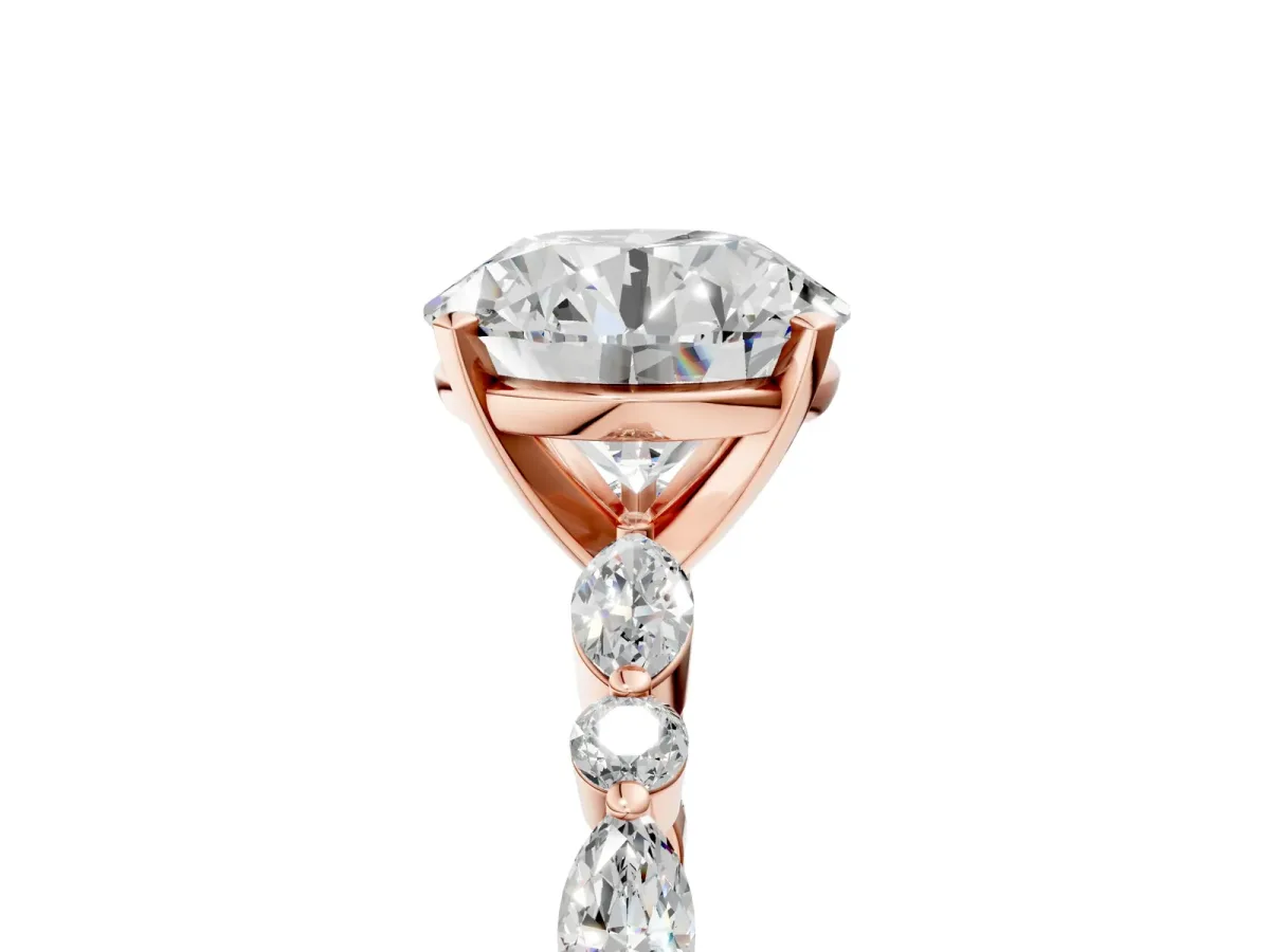 Round Cut Diamond Ring with Marquise and Round Side Stones and Four-Prong Setting Rose gold