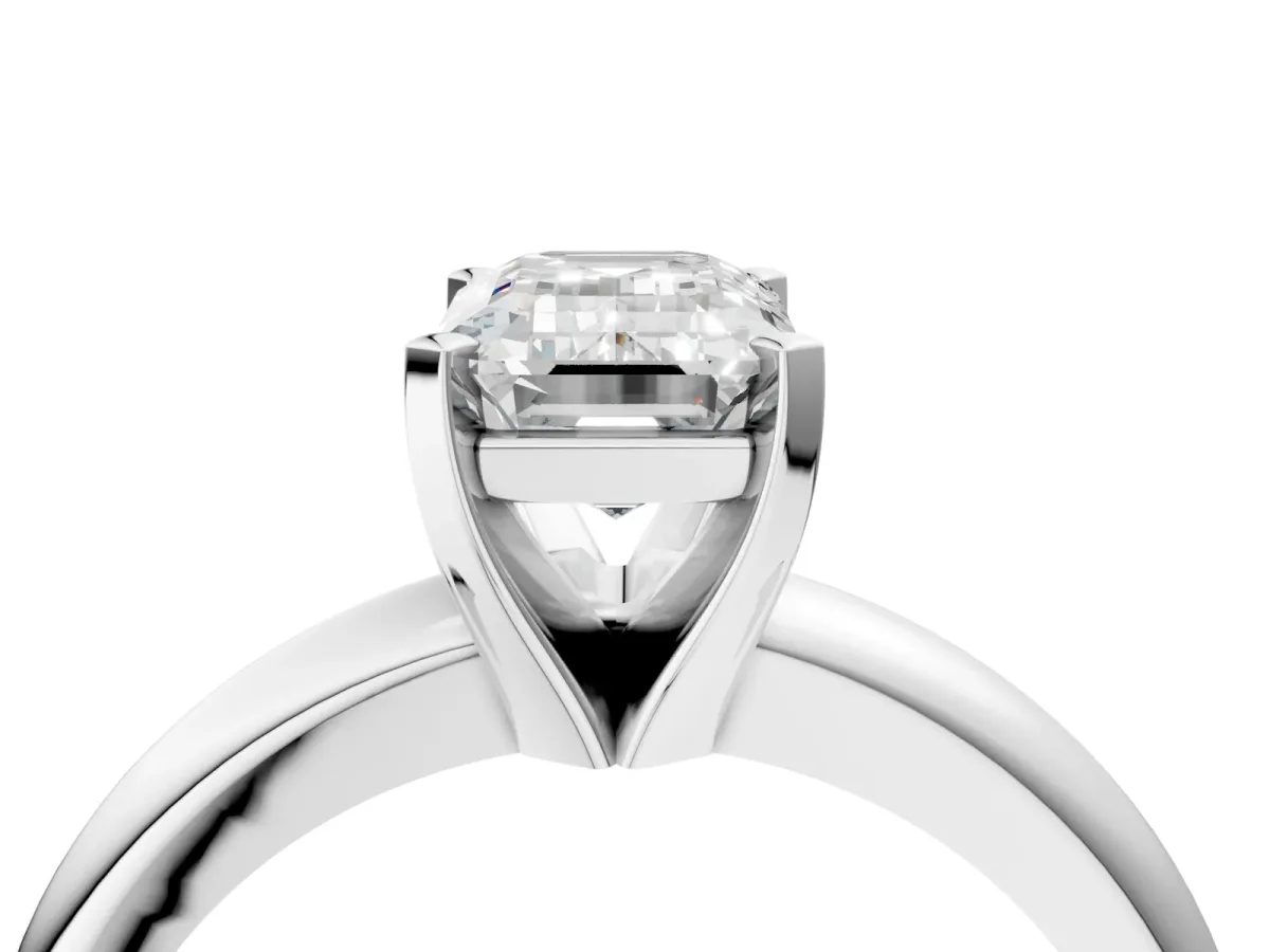Emerald Cut Diamond Solitaire Engagement Ring with Round Band and Four-Prong Setting Silver
