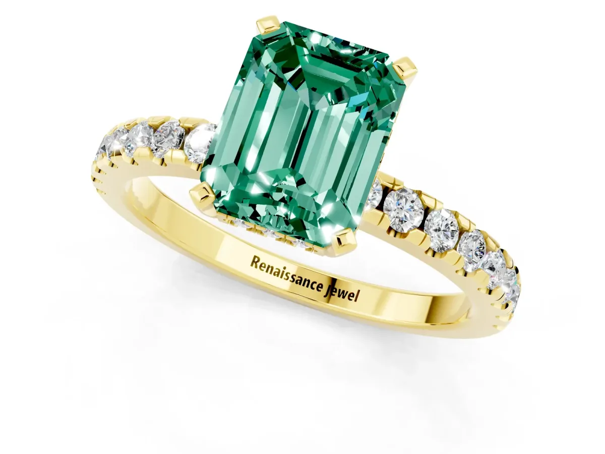 Emerald Cut Green Sapphire Solitaire Ring with Round Pavé Band and Four-Prong Setting Yellow gold