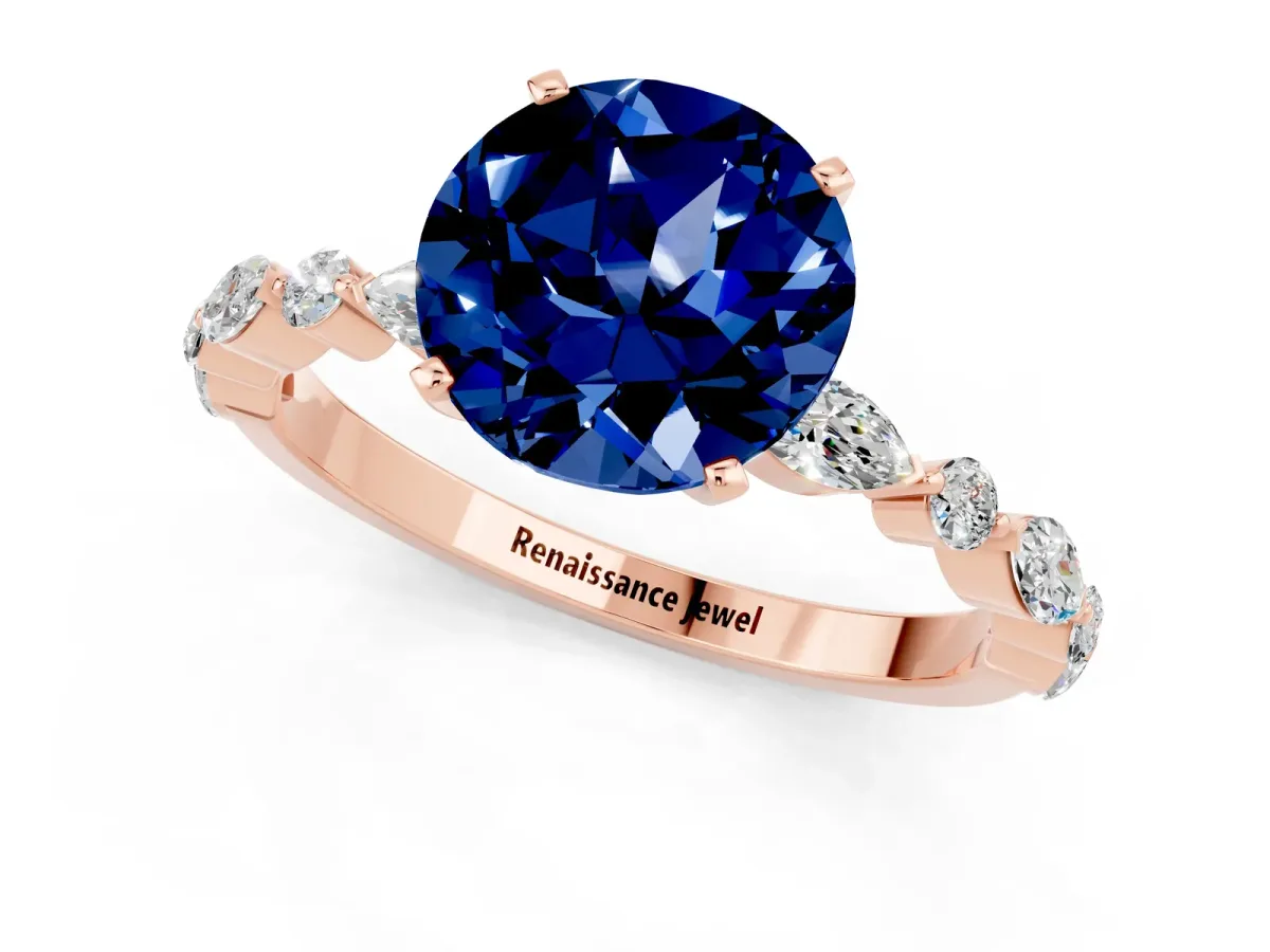 Round Cut Blue Sapphire Ring with Marquise and Round Side Stones and Four-Prong Setting Rose gold