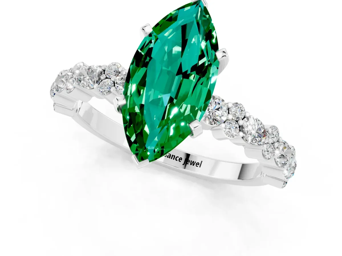 Marquise Cut Emerald Side Stone Solitaire Ring with Round and Four-Prong Setting White gold
