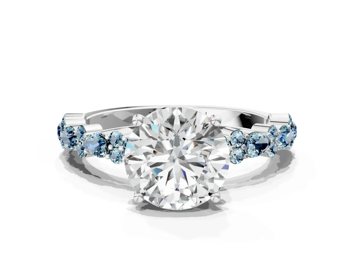 Round Cut Diamond Side Stone Solitaire Ring with Round Tanzanite and Four-Prong Setting Silver