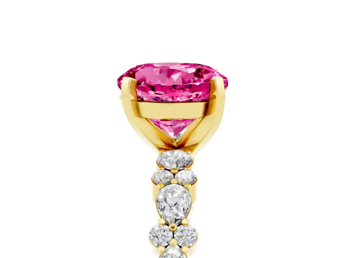 Round Cut Pink Sapphire Side Stone Solitaire Ring with Round and Four-Prong Setting Yellow gold