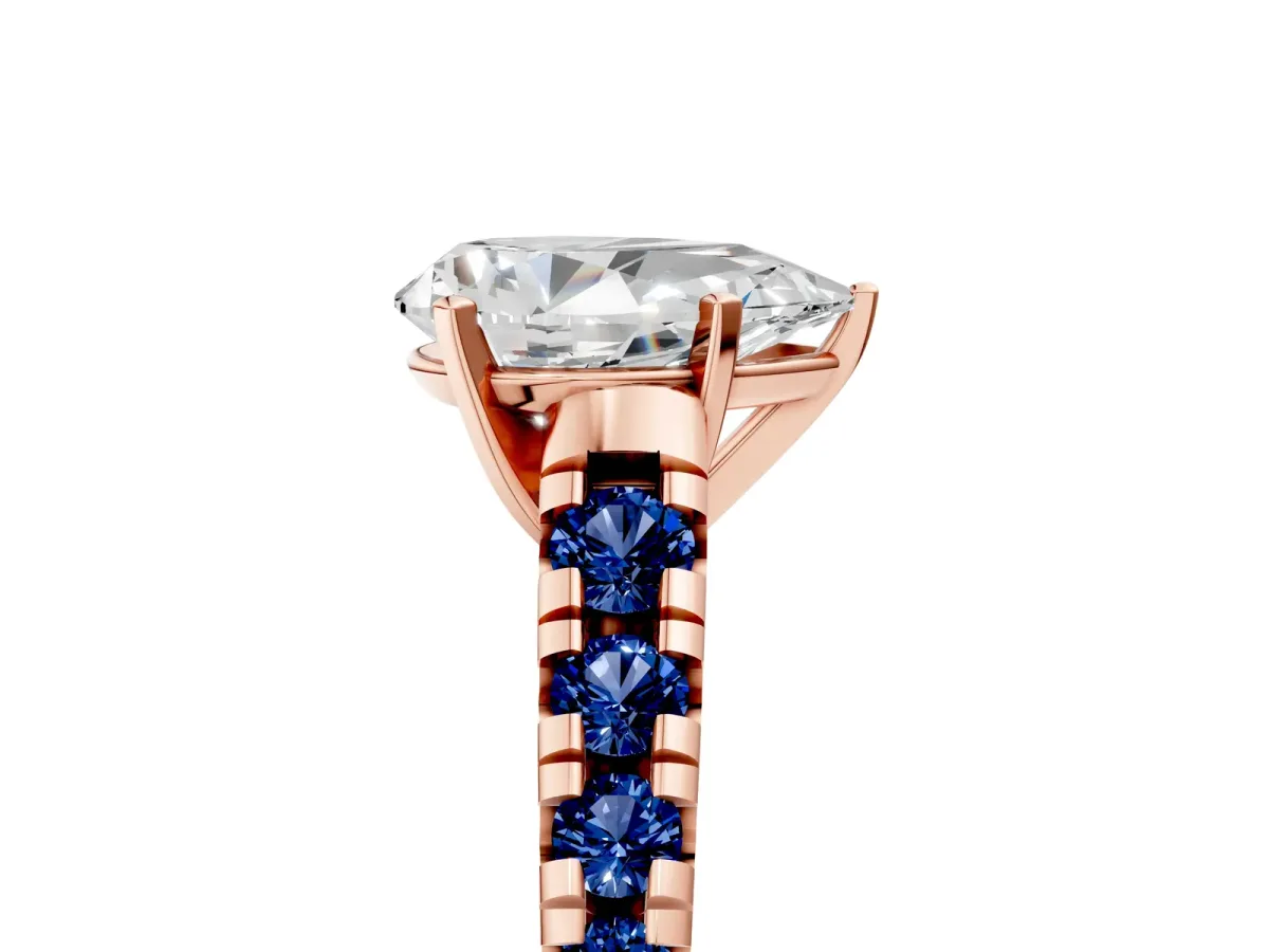 Pear Cut Diamond Cathedral Solitaire Ring with Round Blue Sapphire Pavé Band Rose gold
