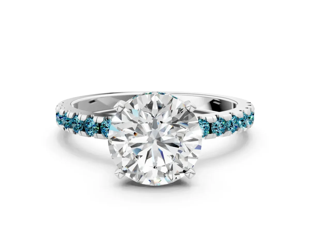 Round Cut Diamond Solitaire Ring with Round Blue Topaz Pavé Band and Four-Prong Setting Silver