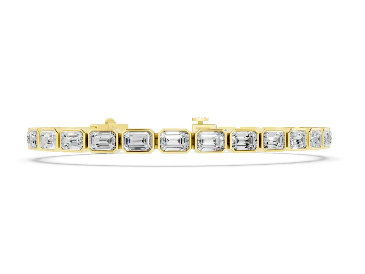 East-West Emerald Cut Diamond Tennis Bracelet with Bezel Setting Yellow gold