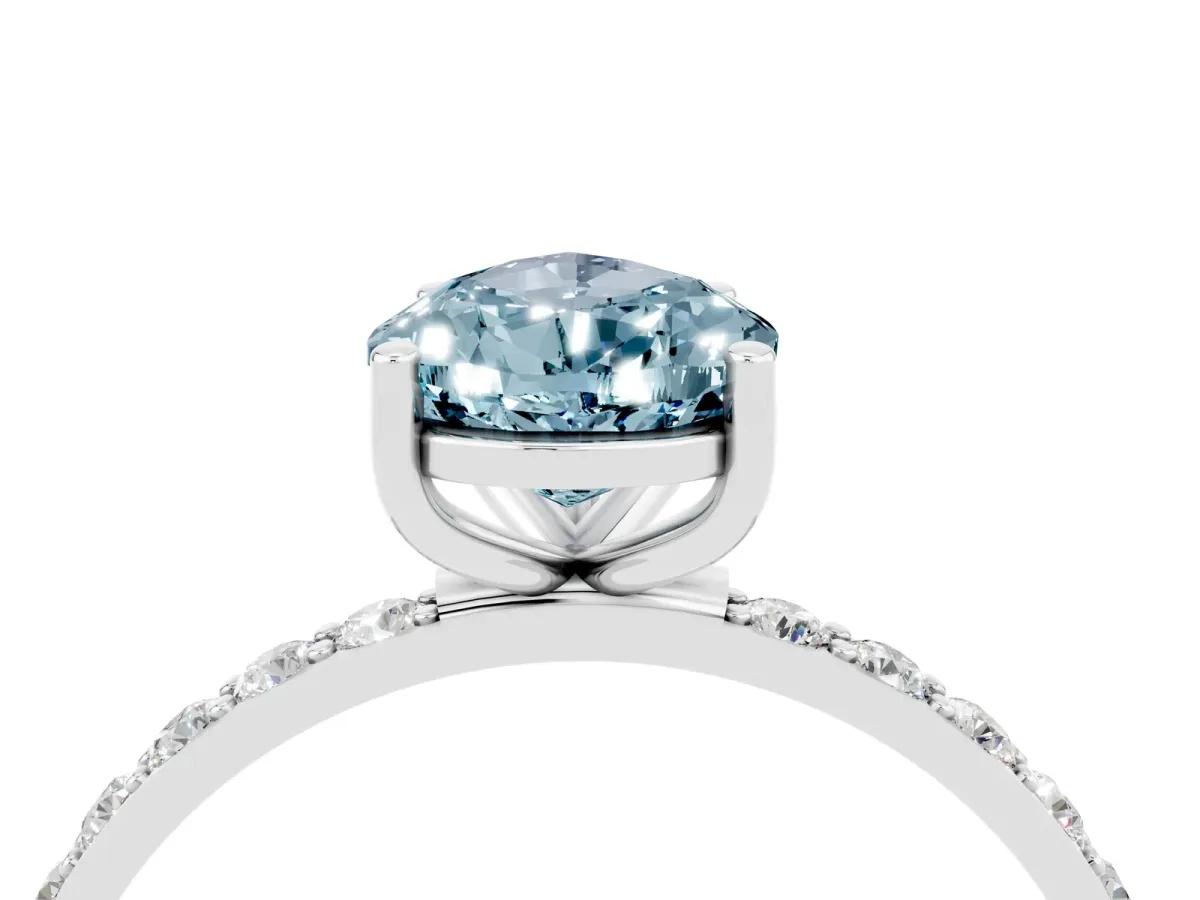 Pear Cut Aquamarine Solitaire Ring with Round Pavé Band and Prong Setting Silver
