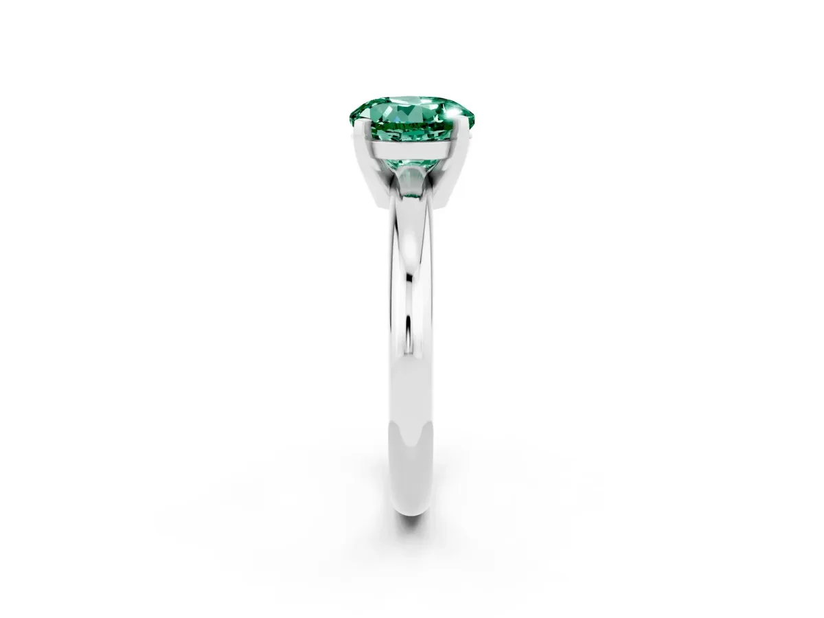 Round Cut Green Sapphire Solitaire Engagement Ring with Round Band and Four-Prong Setting Silver