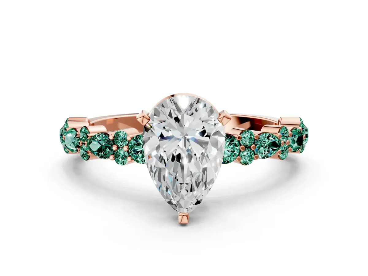 Pear Cut Diamond Side Stone Solitaire Ring with Round Green Sapphire and Four-Prong Setting Rose gold