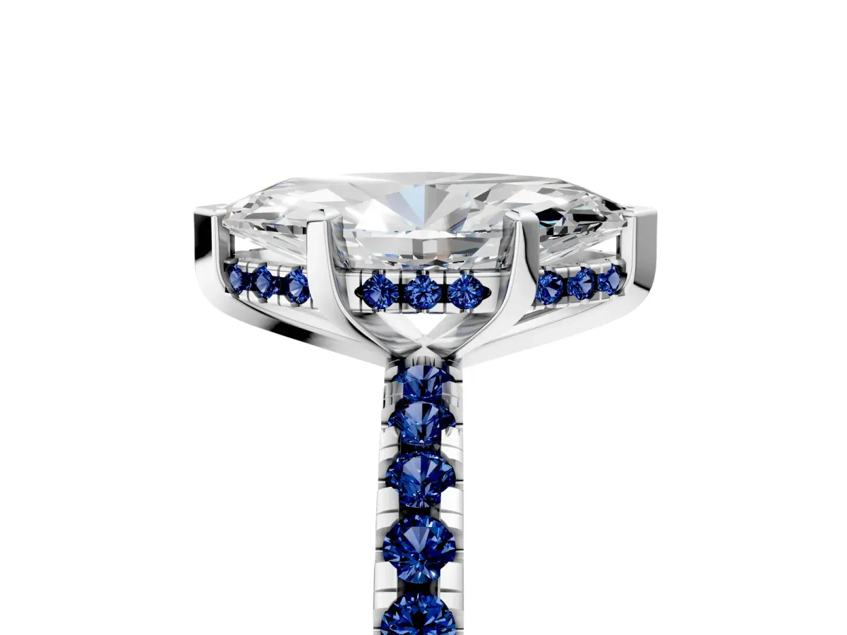 Marquise Cut Diamond Solitaire Ring with Round Blue Sapphire Pavé Band and Four-Prong Setting Silver