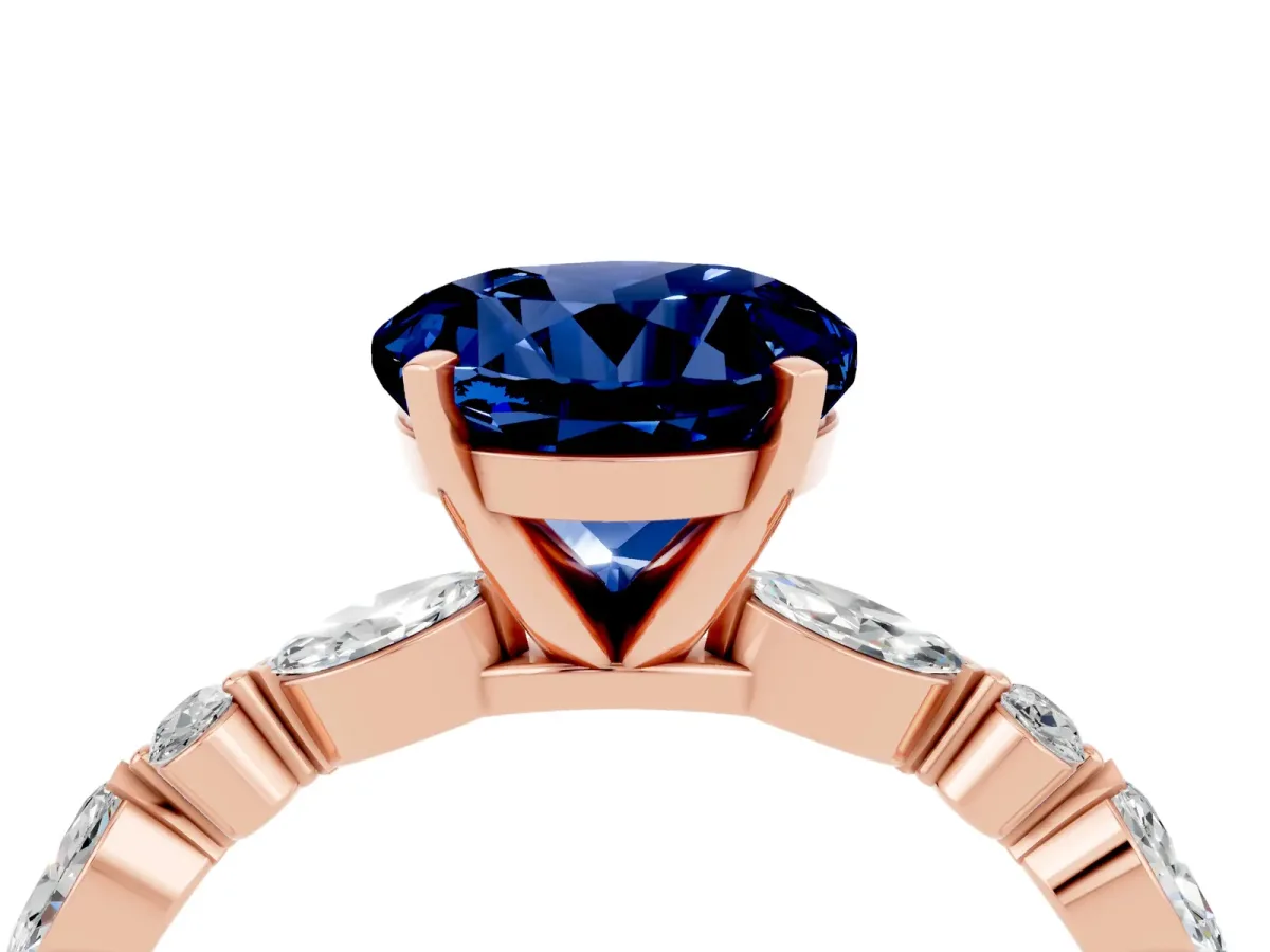 Round Cut Blue Sapphire Ring with Marquise and Round Side Stones and Four-Prong Setting Rose gold