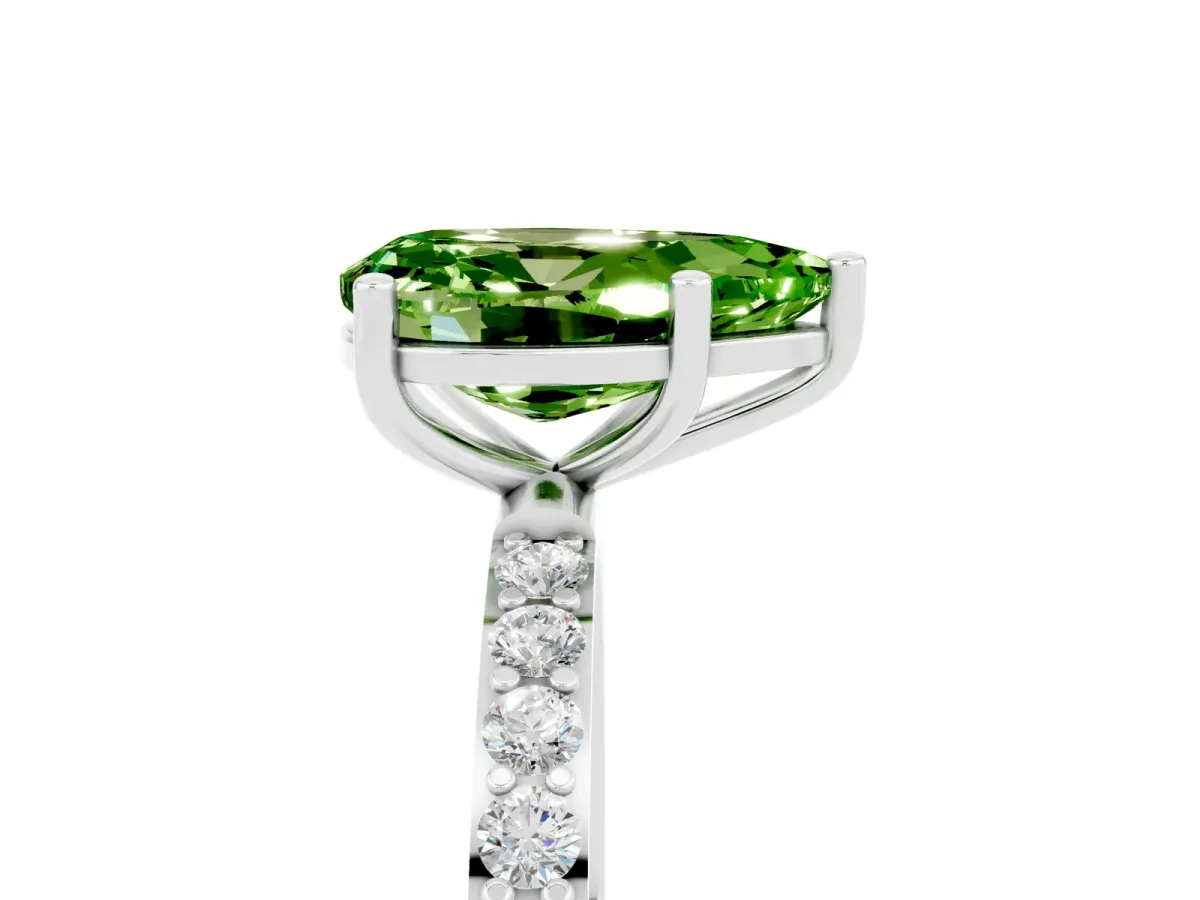 Pear Cut Peridot Solitaire Ring with Round Pavé Band and Prong Setting Platinum