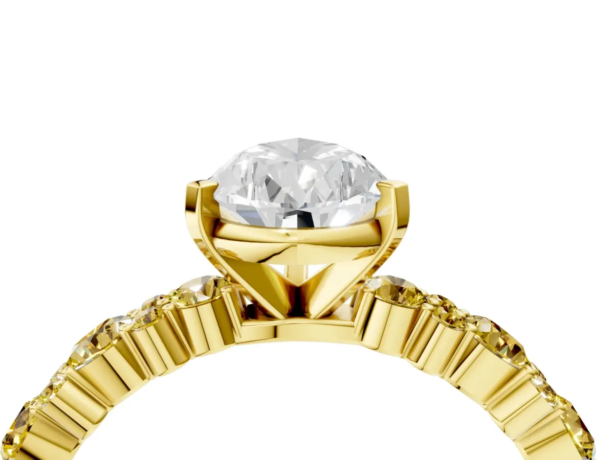 Pear Cut Diamond Side Stone Solitaire Ring with Round Yellow Sapphire and Four-Prong Setting Yellow gold