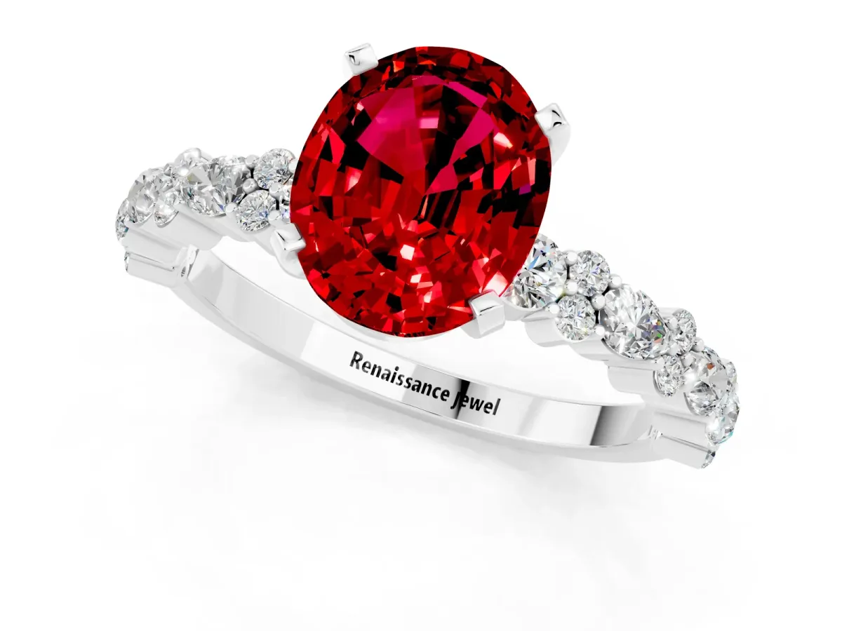 Oval Cut Ruby Side Stone Solitaire Ring with Round and Four-Prong Setting White gold
