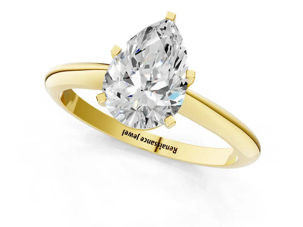 Pear Cut Diamond Solitaire Engagement Ring with Classic Band and Four-Prong Setting Yellow gold
