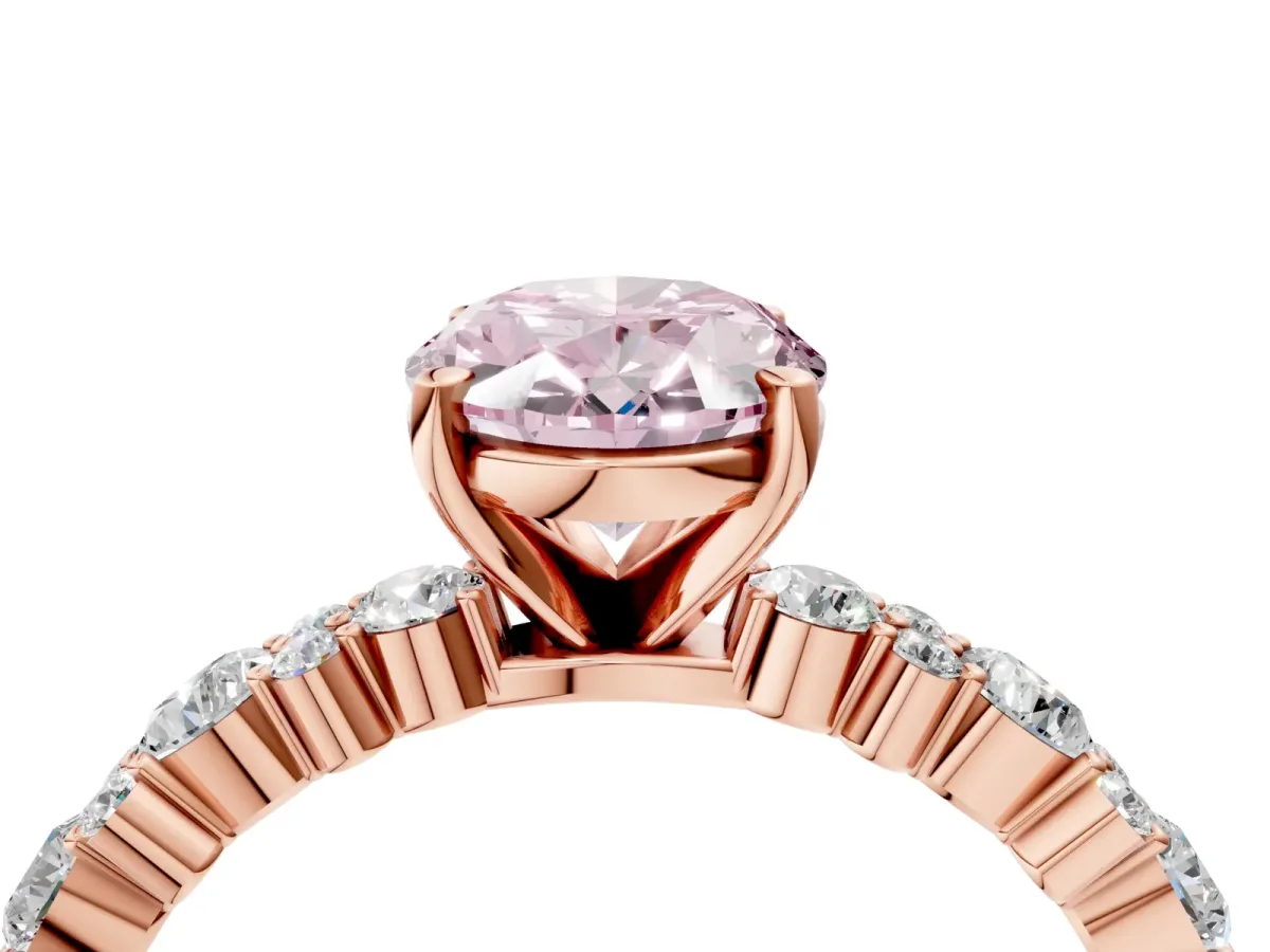 Fancy Pink Oval Cut Diamond Side Stone Solitaire Ring with Round and Four-Prong Setting Rose gold