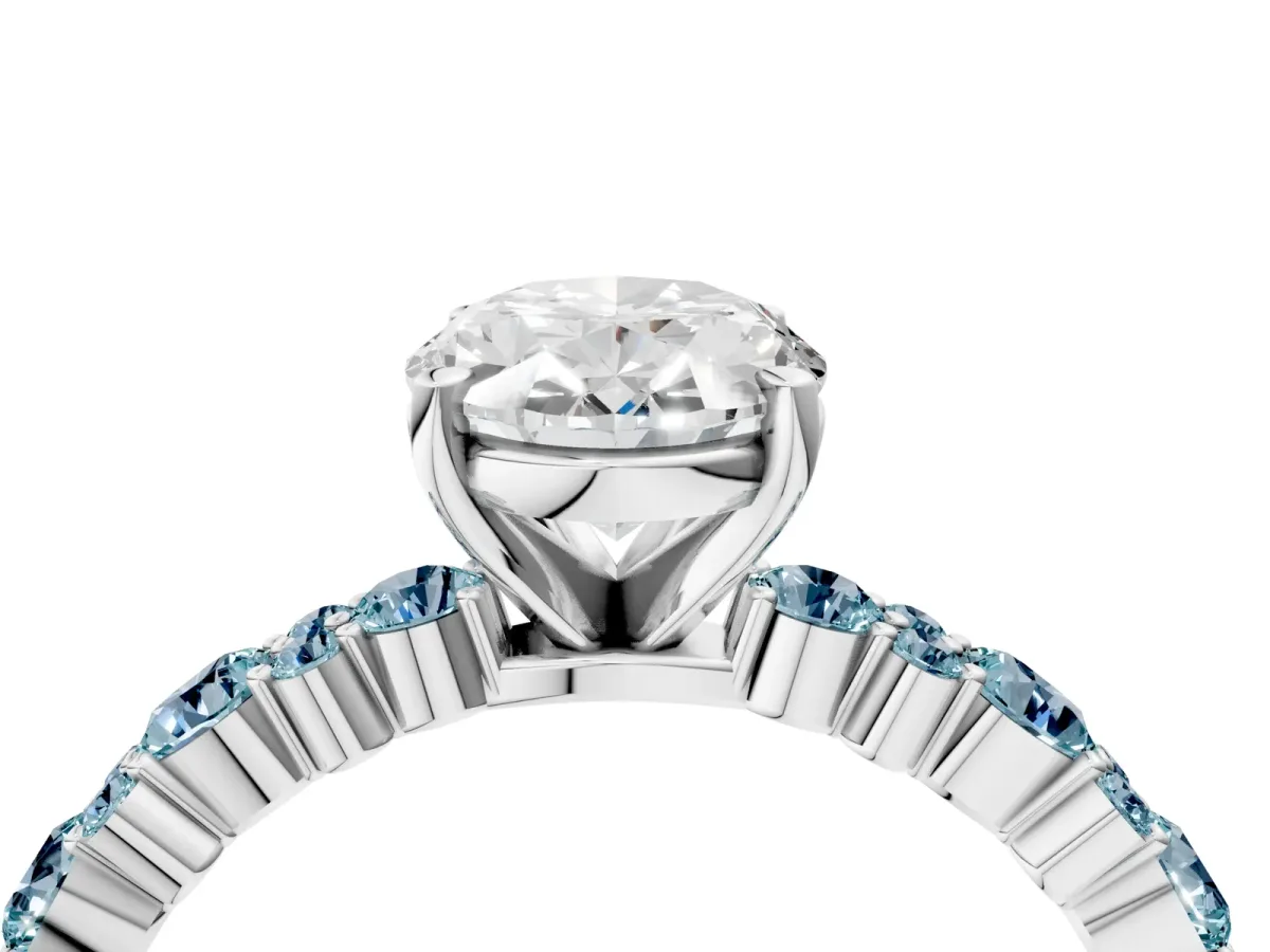 Oval Cut Diamond Side Stone Solitaire Ring with Round Aquamarine and Four-Prong Setting White gold